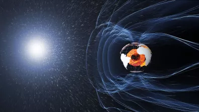 Le champ magnétique protège la Terre du vent solaire. Le champ magnétique protège la Terre du vent solaire.